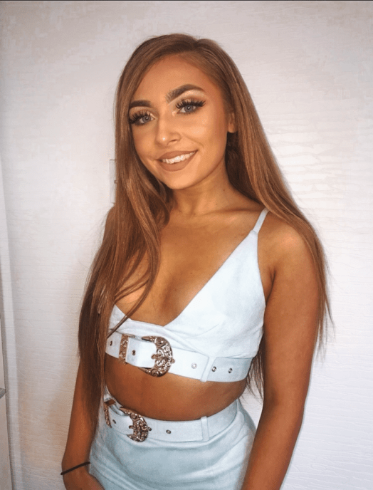 Image of me in the pastel blue, suede two piece